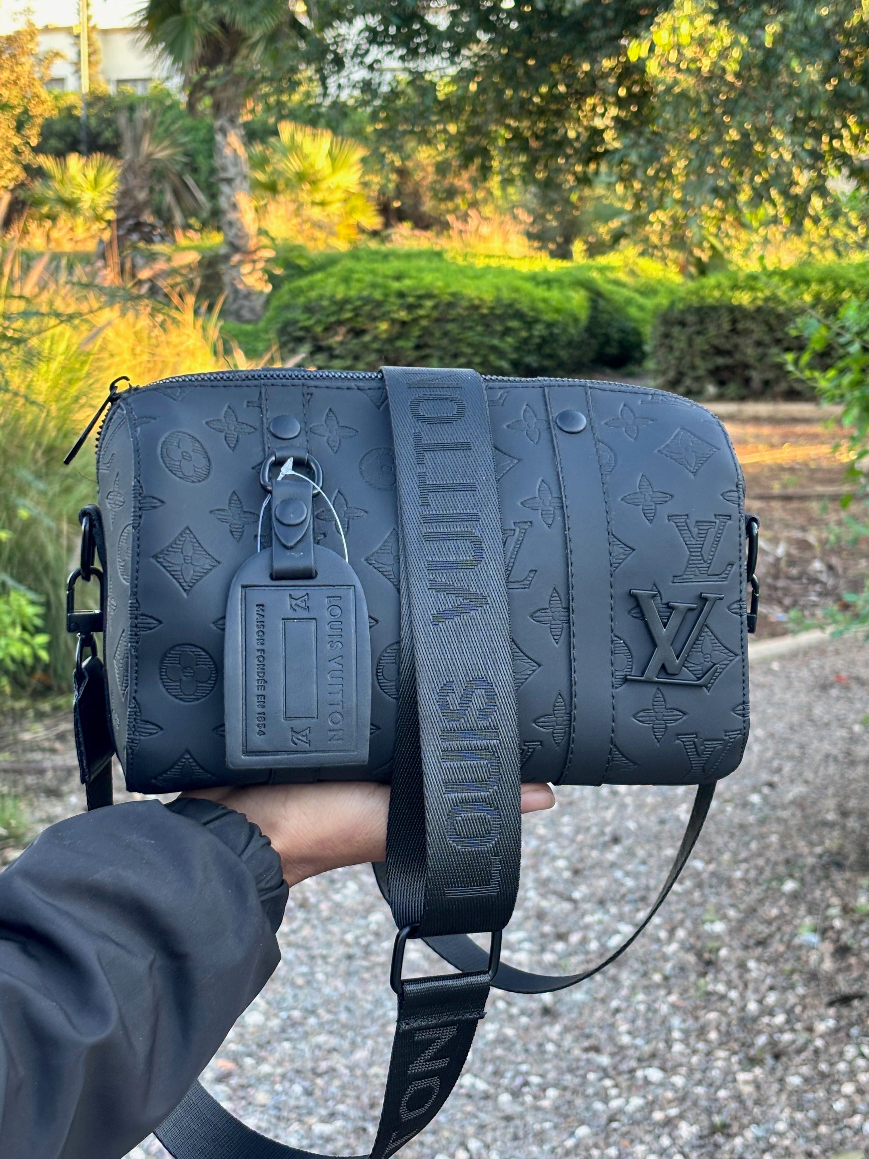 Le Sac de Louis Vuitton Keepall Homme En Cuir Noir